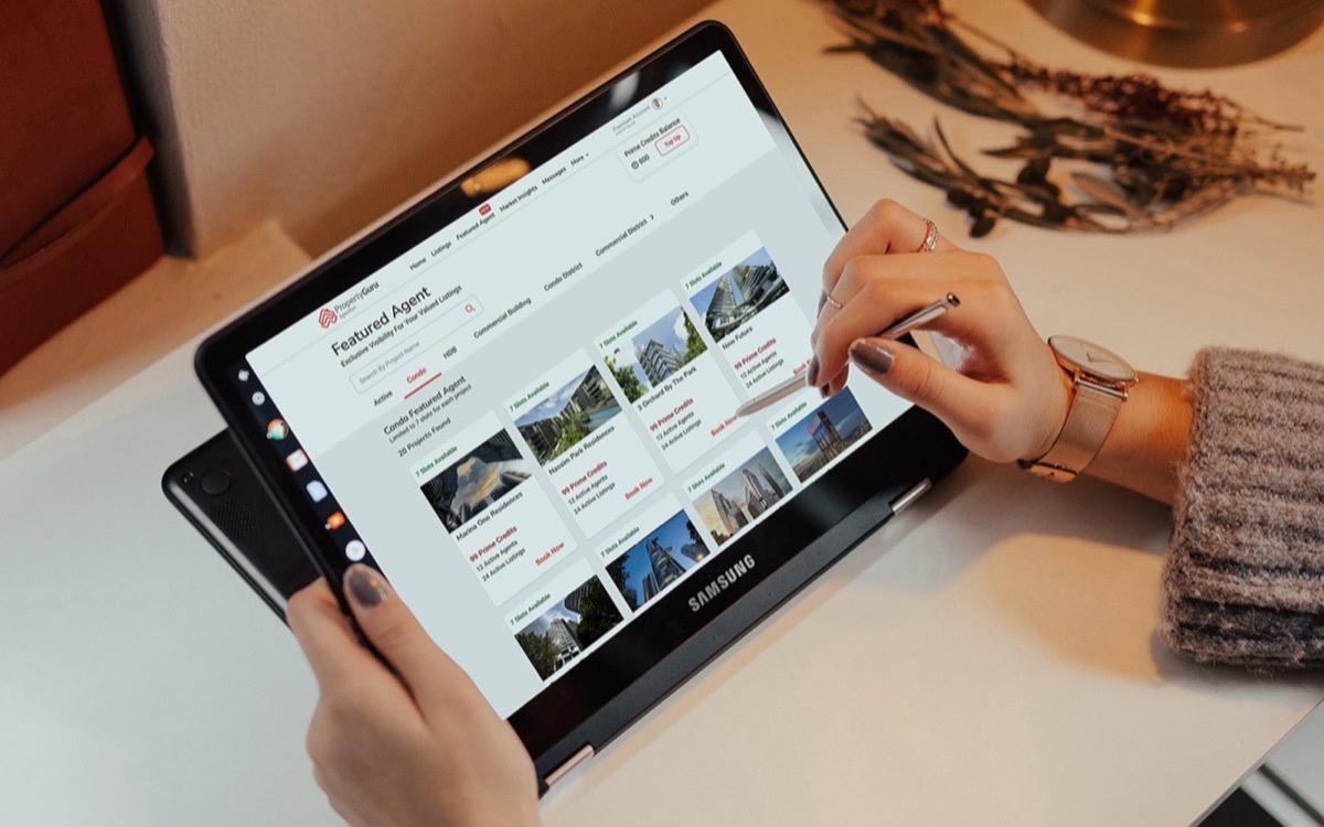 The Featured Agent self-serve booking interface shown on a tablet.
